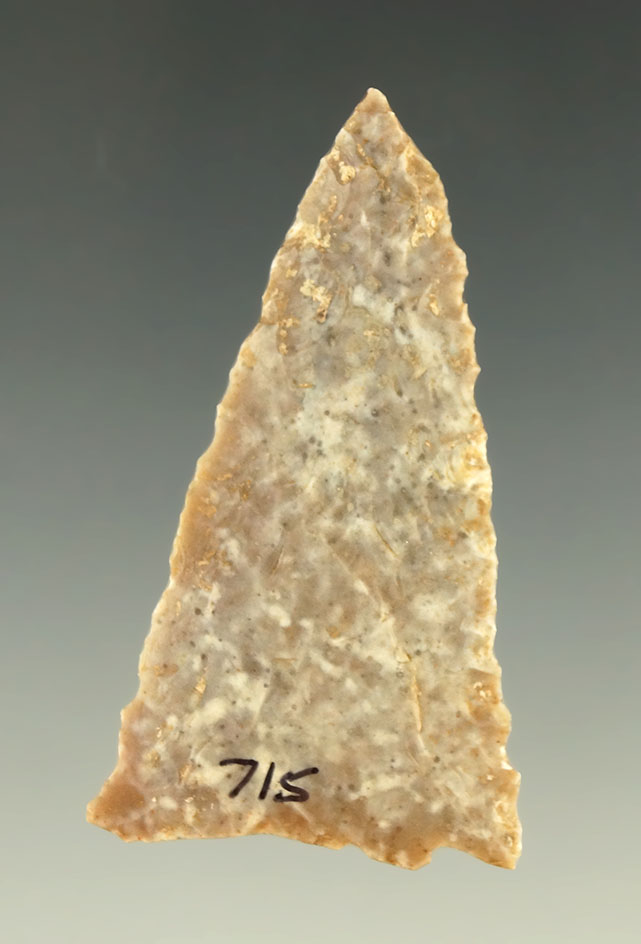 2 1/8" well patinated Early Triangle arrowhead found in Comal County Texas.