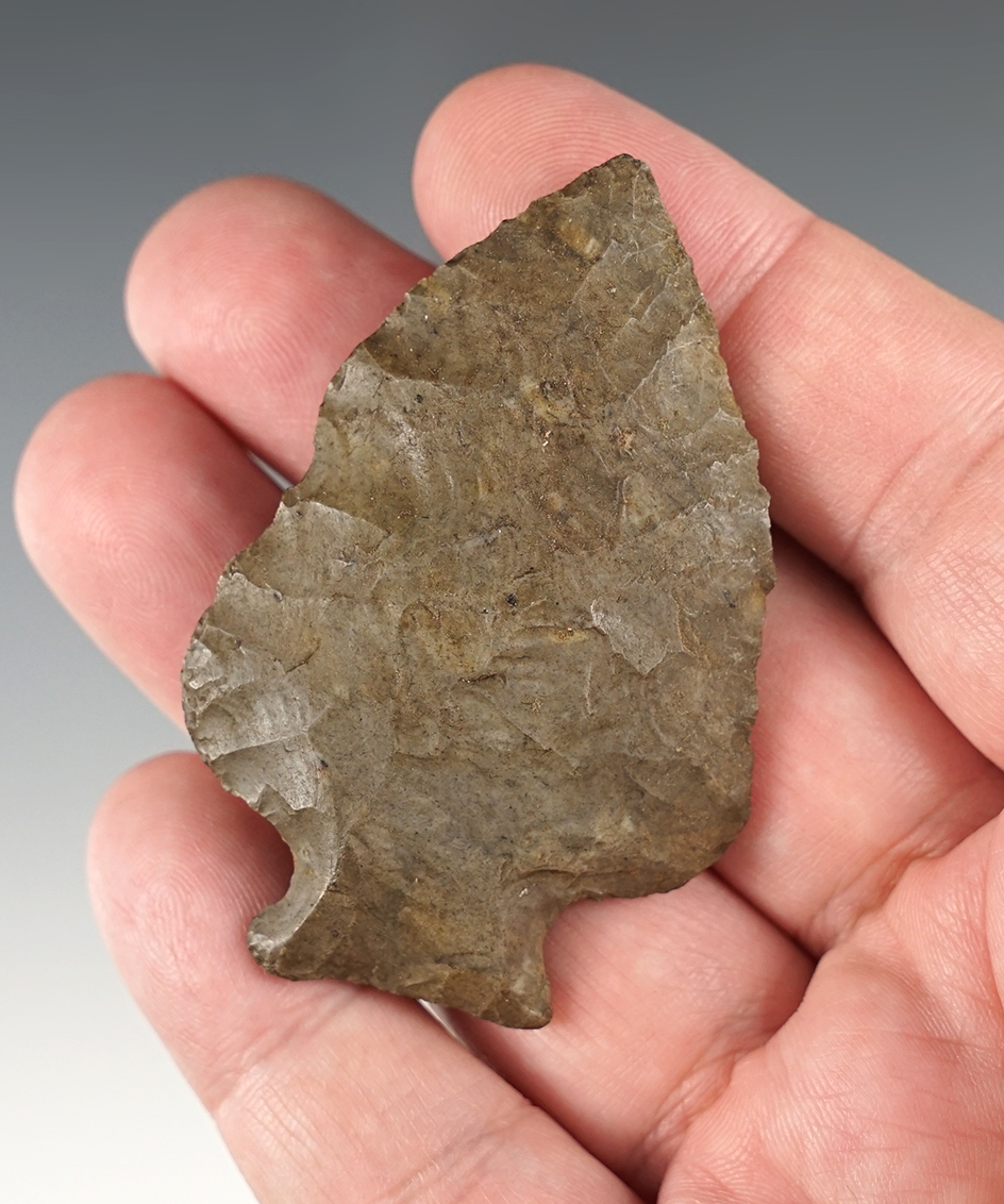 2 1/2" Bottle Neck style point made from heavily patinated flint. Found in Tennessee.