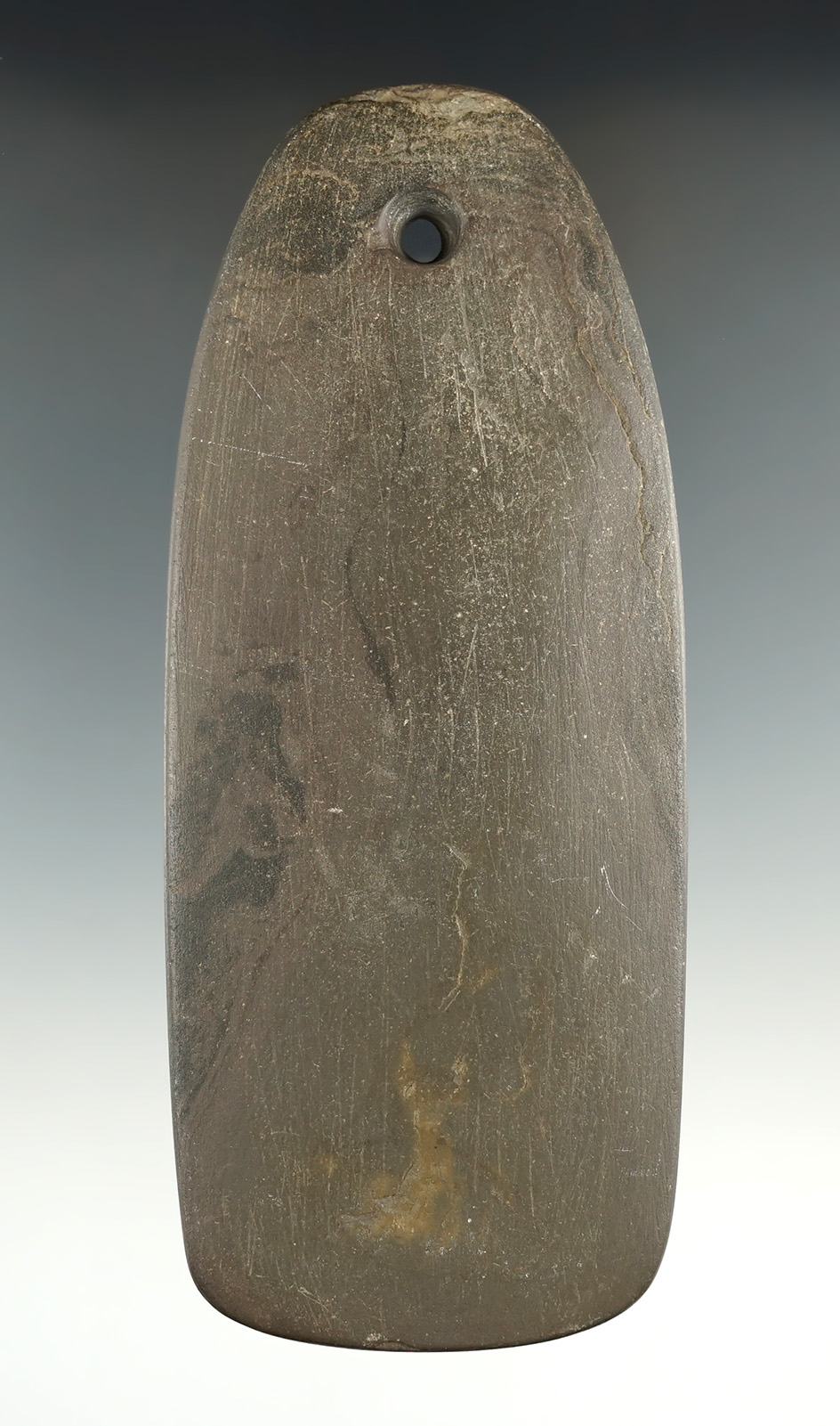 5 3/8" Adena Trapezoidal Pendant made from red and black Mottled Slate, found in Ohio.