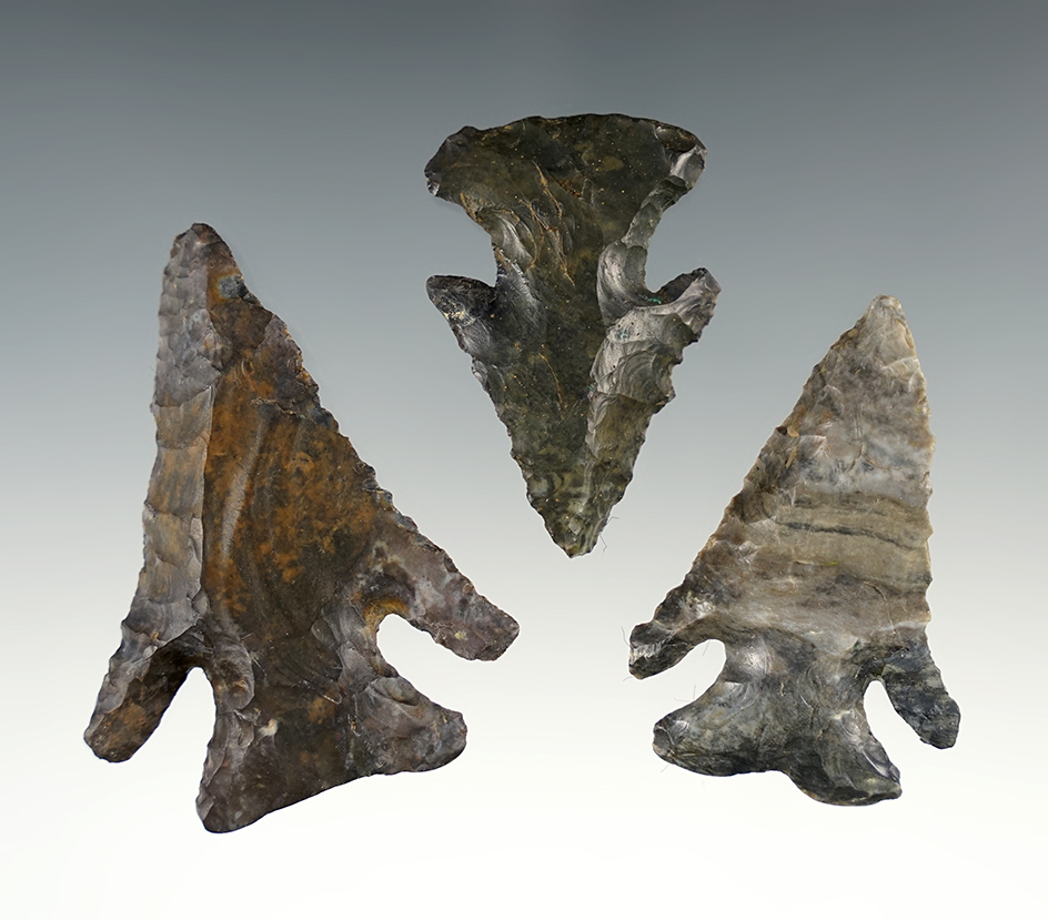 Set of 3 Ohio Thebes points. All have one ear restored. The Largest is 2 1/2".