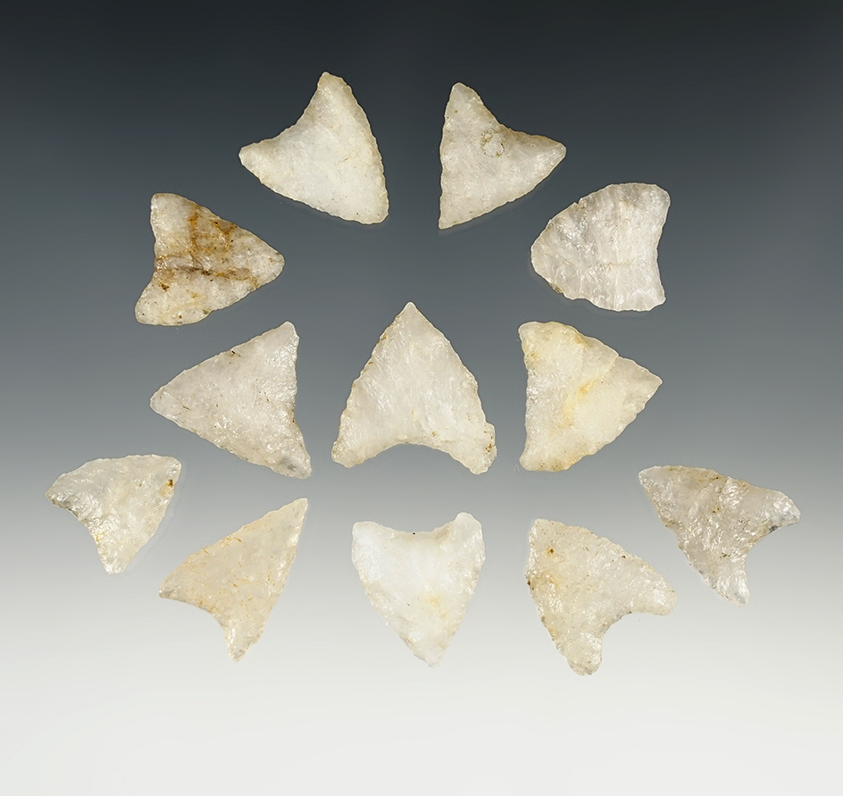 Set of 12 Triangle points made from Quartz. Found in the Eastern U.S. The largest is 15/16".