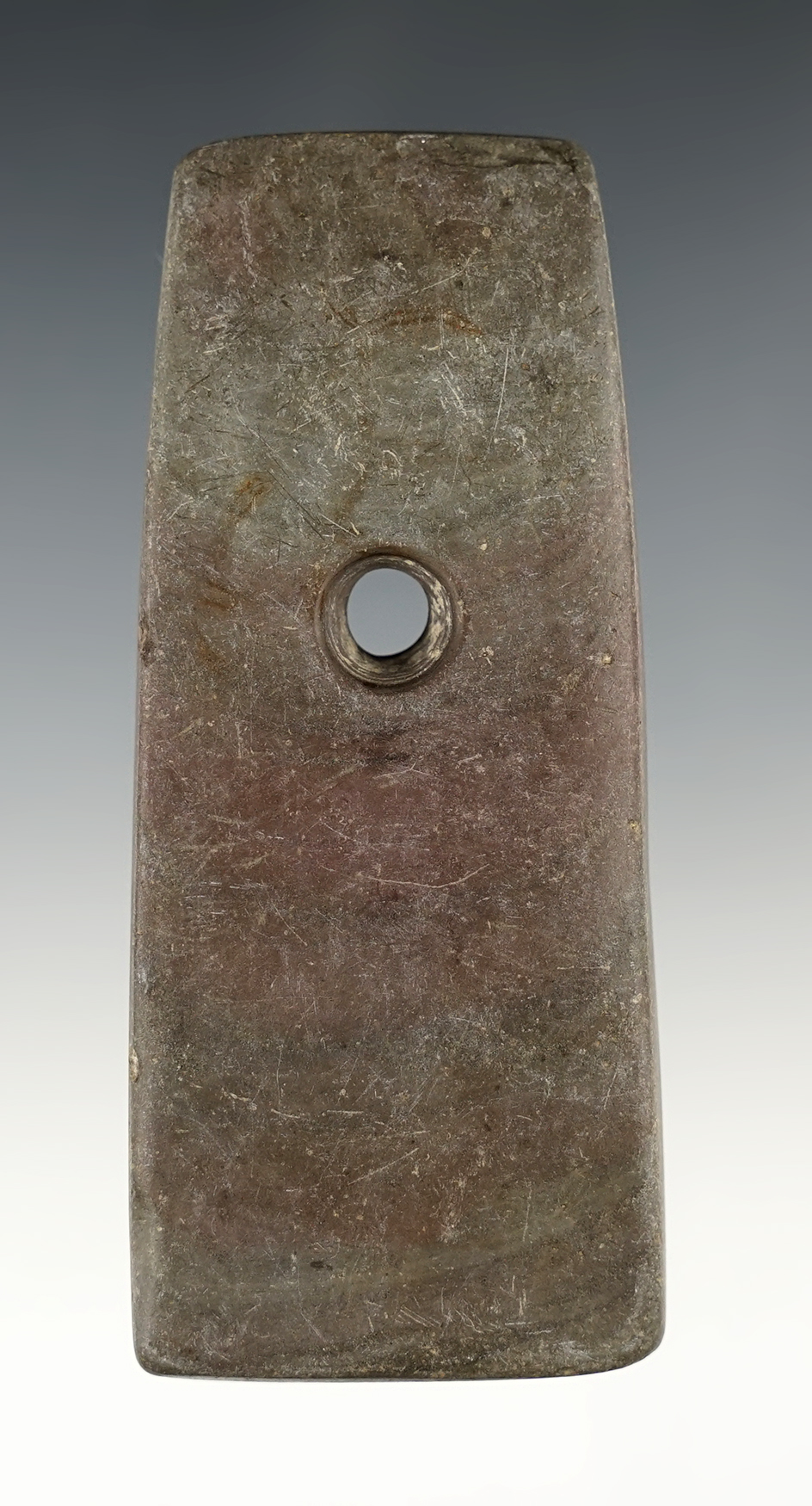 3 3/4" Adena Trapezoidal Pendant made from red and green Slate. Found in Wood Co., Ohio.