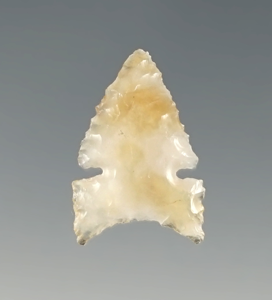 3/4" Desert Delta with incredible micro-notches. Made from semi-translucent Chalcedony.