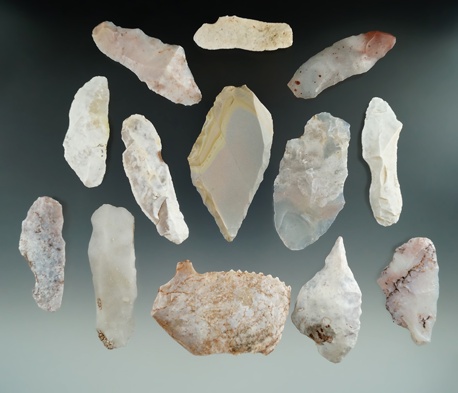 Set of 13 assorted flaked tools including Knives, scrapers and perforators. Largest is 2 7/8".