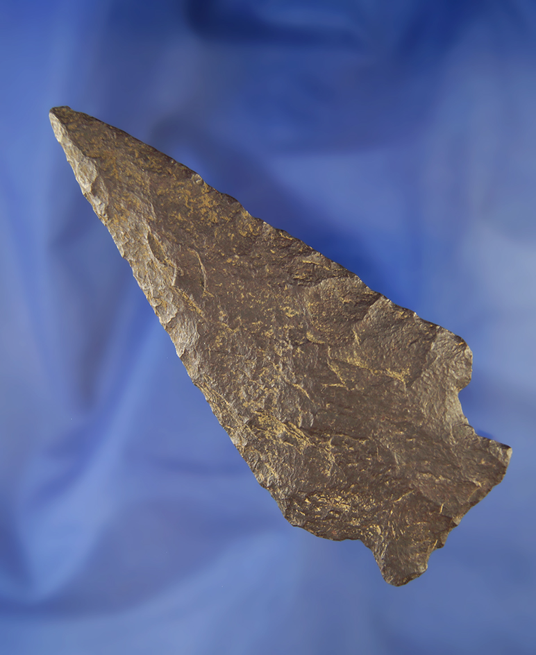 Large 4 3/8" black chert Knife that is heavily weathered found in Richland Co.,  Ohio.