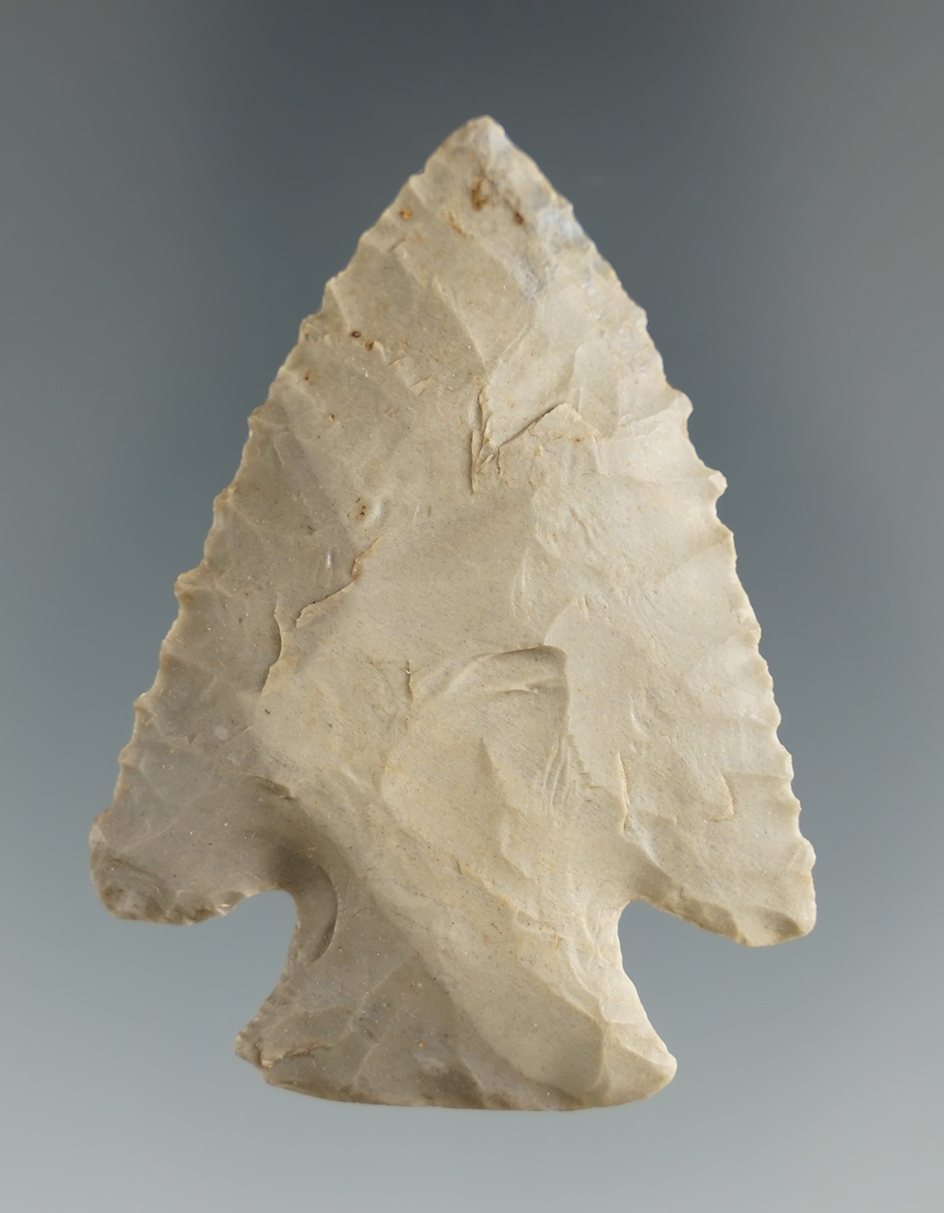 Excellent flaking on this 2 3/16" Lost Lake made from hornstone. Found in Indiana.