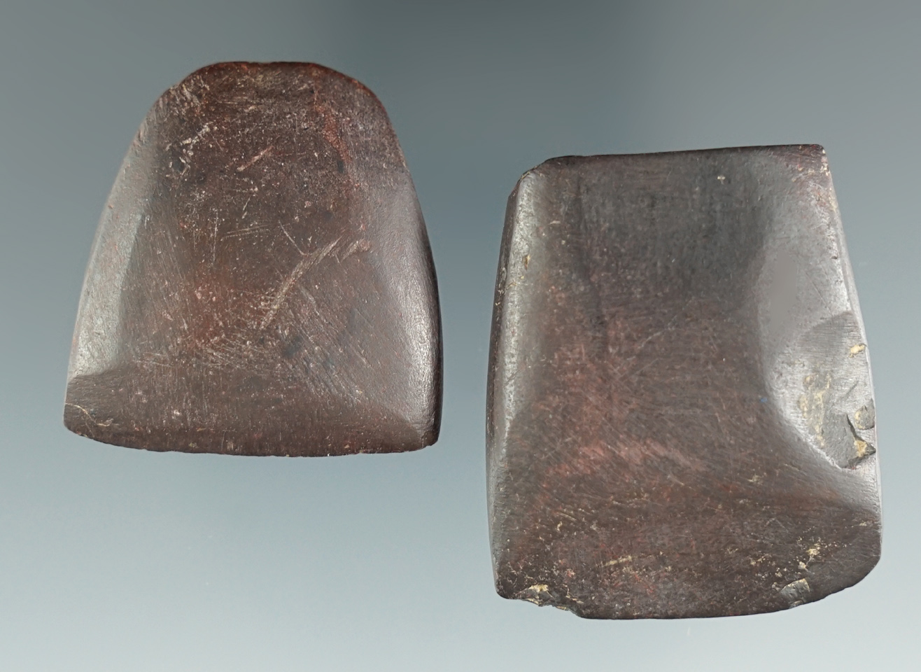 Pair of Hematite Celts, largest is 1 5/8" and is marked 3537 W. Morrow Co., Ohio. Other is 1 3/8".
