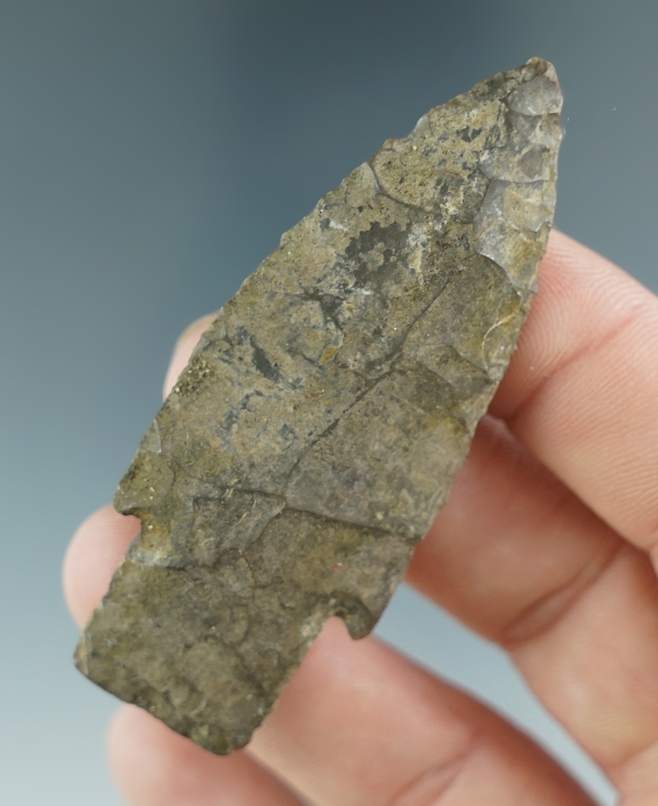 2 5/8" Scottsbluff that is heavily patinated found in Illinois.
