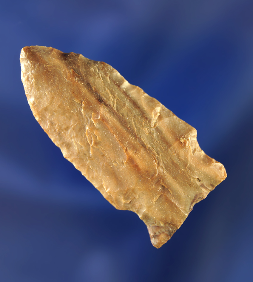 1 7/8" arrowhead made from nicely striped petrified wood.