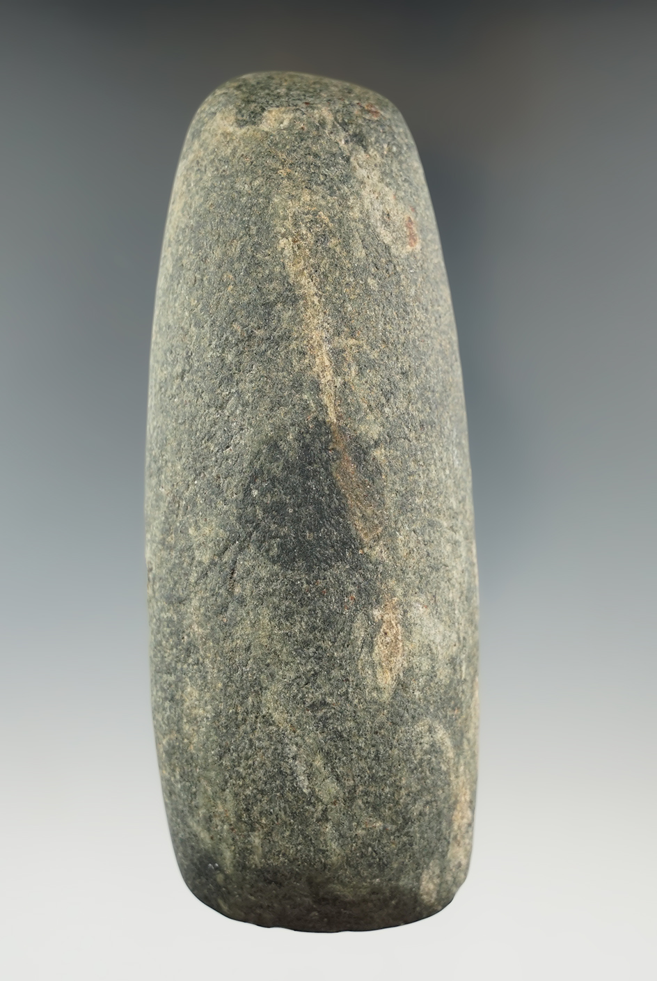 4 3/4" Adena Adze made of green granite with cream colored mottling throughout. Ohio.