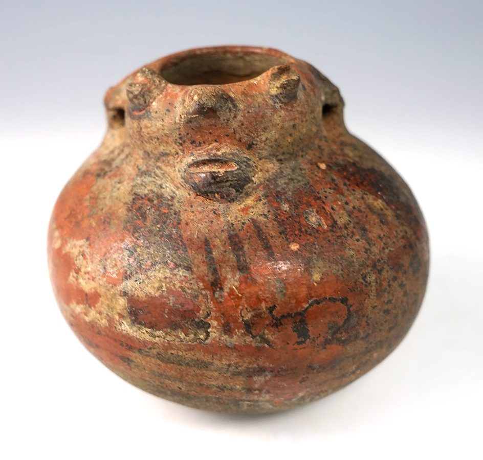 2 5/8" tall x 3" wide painted Human Effigy bottle found in Costa Rica.