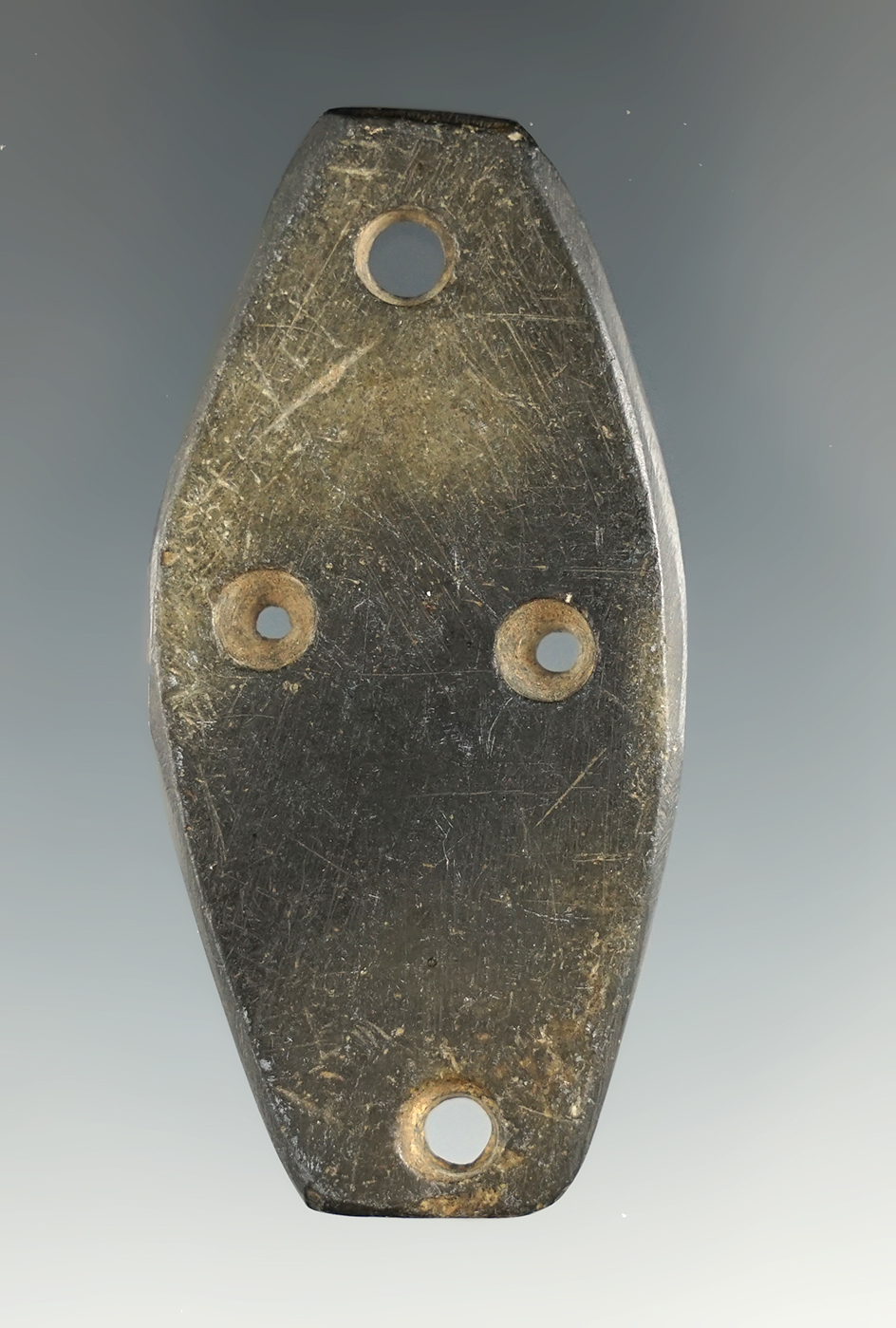 2 3/8" Miniature Four Hole Gorget made from black Slate, found in Paulding Co., Ohio. Ex. Mink.