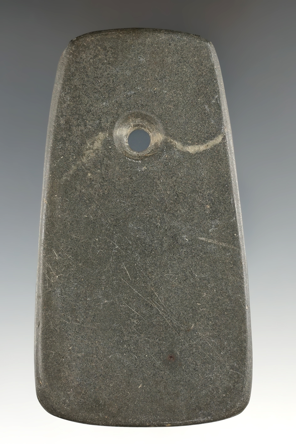 3 15/16" Adena Trapezoidal Pendant made from Slate. Previously displayed at the Purdue University.