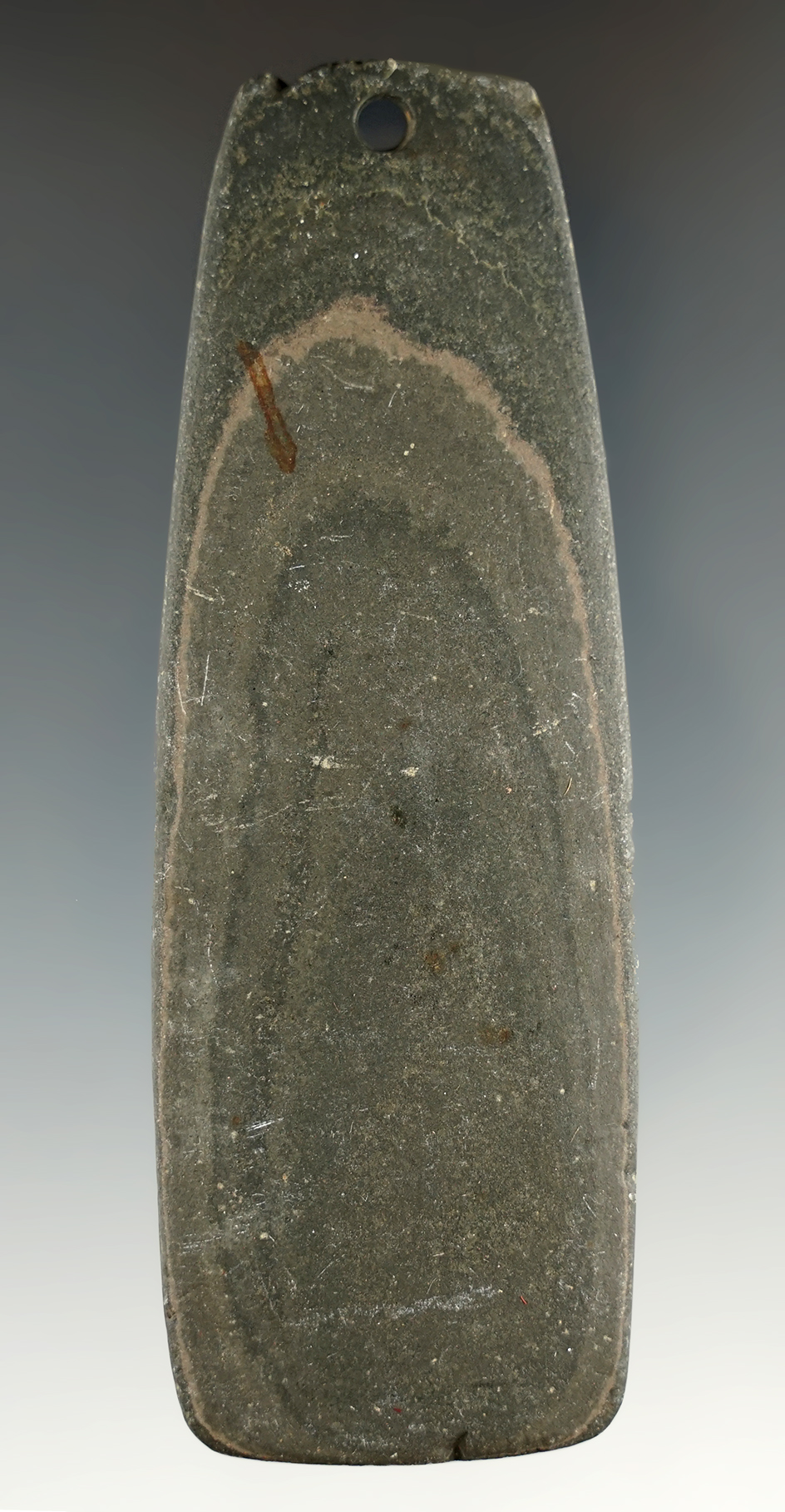 4" Hopewell Trapezoidal Pendant that is fringed and tallied. Found in Franklin Co., Ohio in 1928.