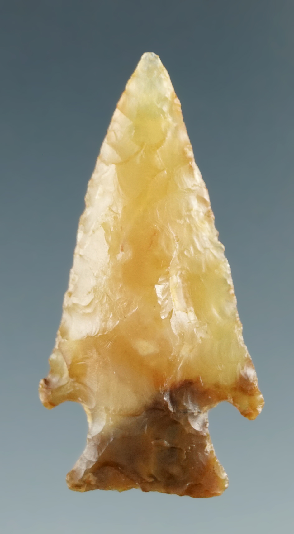 1 1/4" Snake River Dart made from Translucent Yellow-Orange Agate, found near the Columbia River.