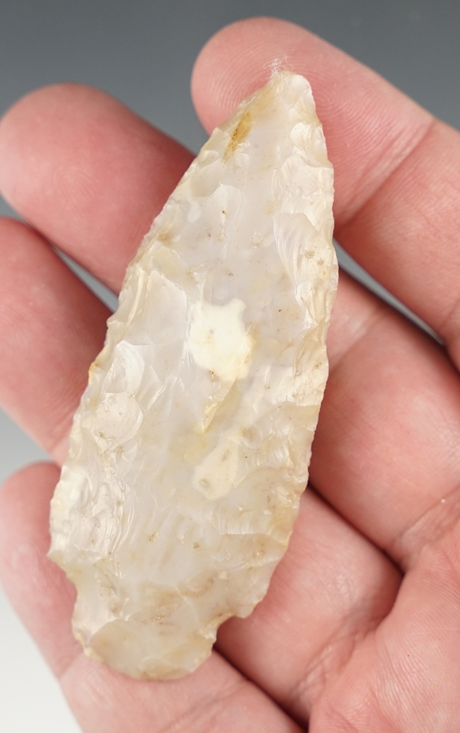 2 15/16" Stemmed Ohio point made from glossy Flint Ridge flint.