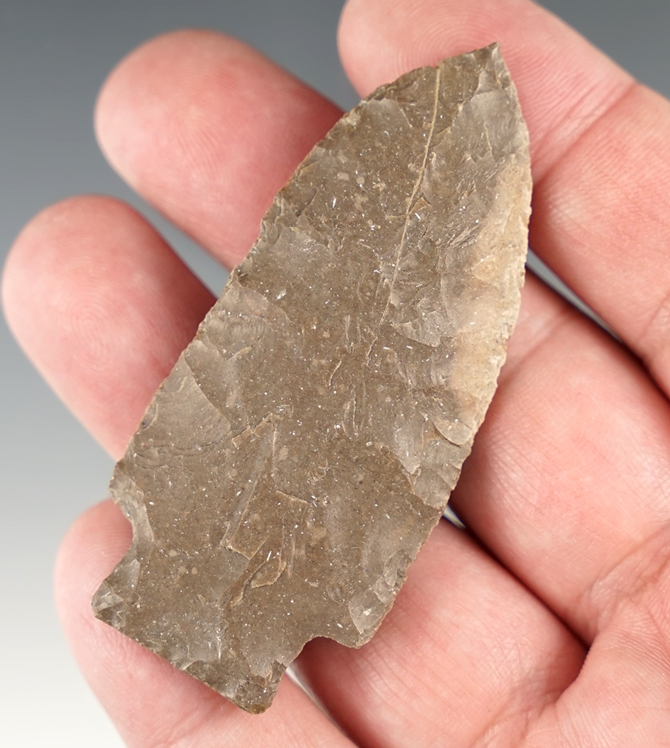 2 11/16" Midwest Stemmed point with good ancient grinding to the basal area.