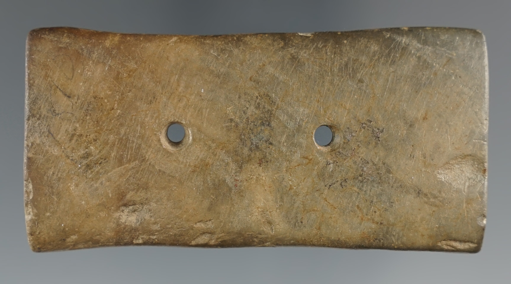 2 7/8" Rare Miniature Tablet Gorget made from green and tan Slate. Found in Ross Co., Ohio.