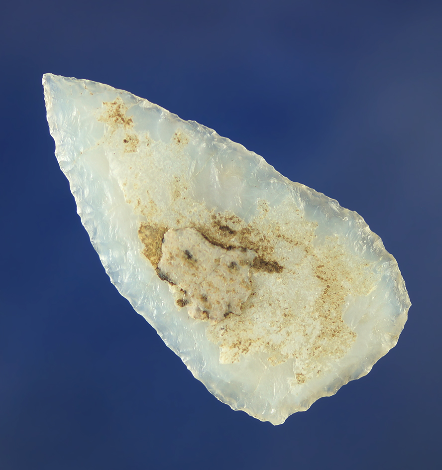 Thin and nicely flaked 1 15/16" Knife made from highly translucent sheet chalcedony.