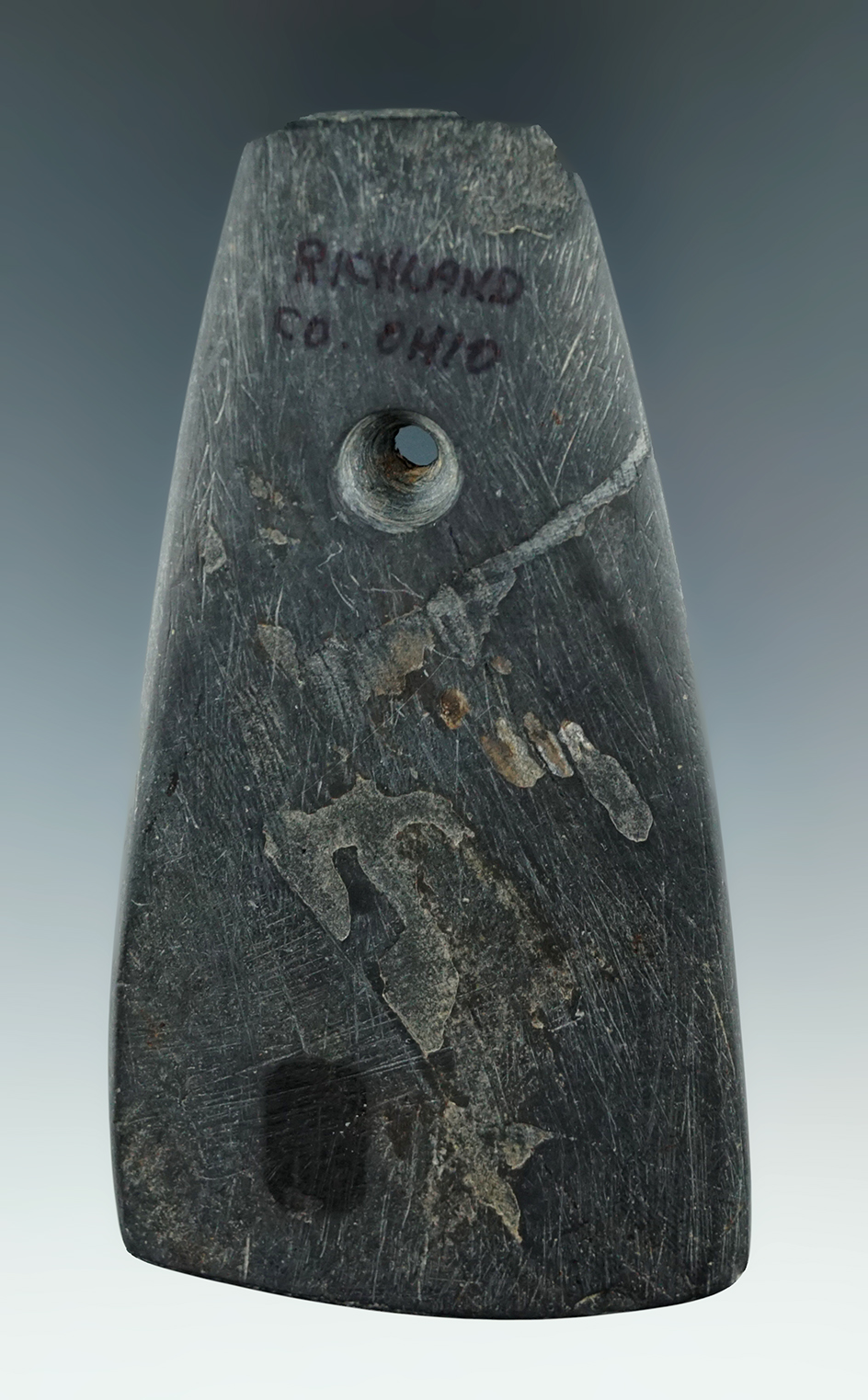 3 3/4" Trapezoidal Slate Pendant found in Richland Co., Ohio. Ex. Doug Hooks.