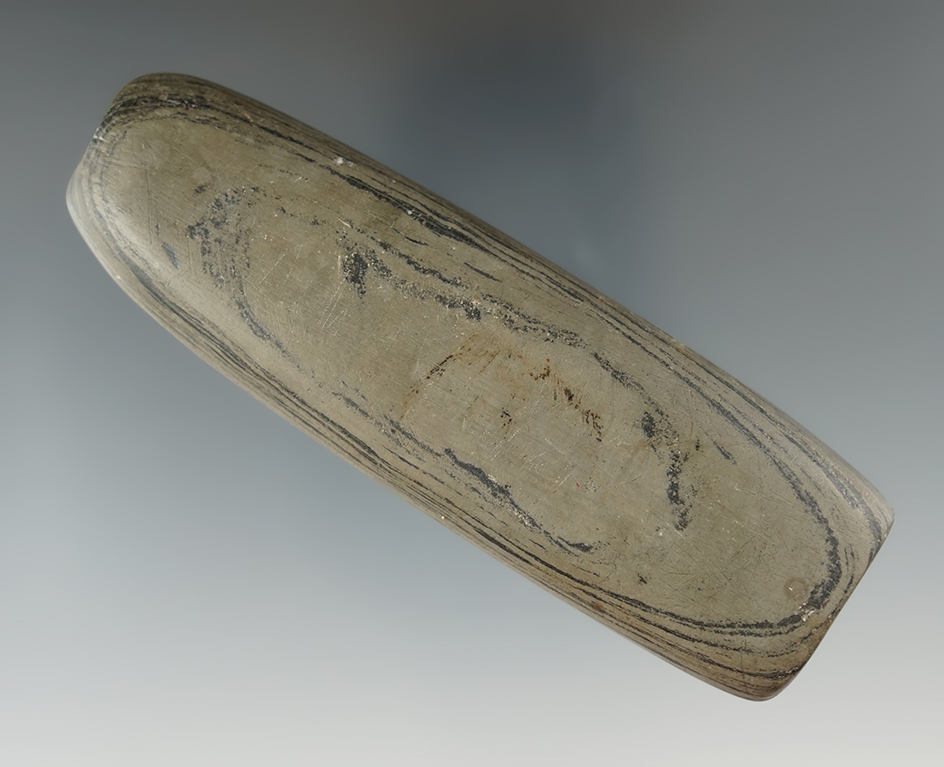 3 7/8" Tube Bannerstone with unique flutes on both sides. Professional restoration to one end.