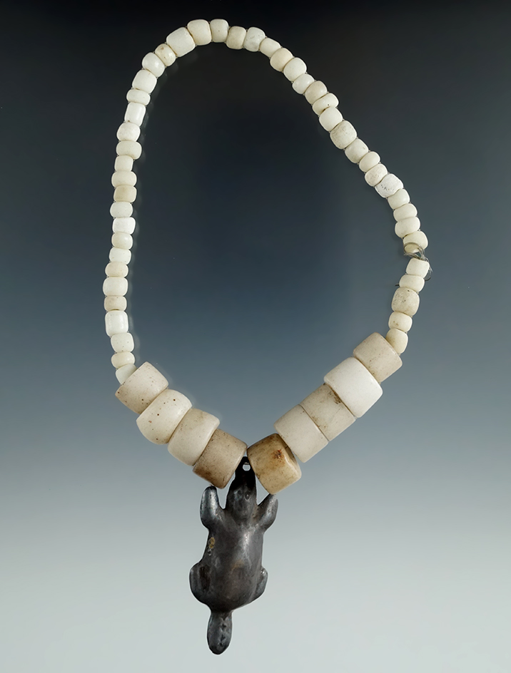 9" Strand of attractive beads with a metal beaver pendant found in New York.