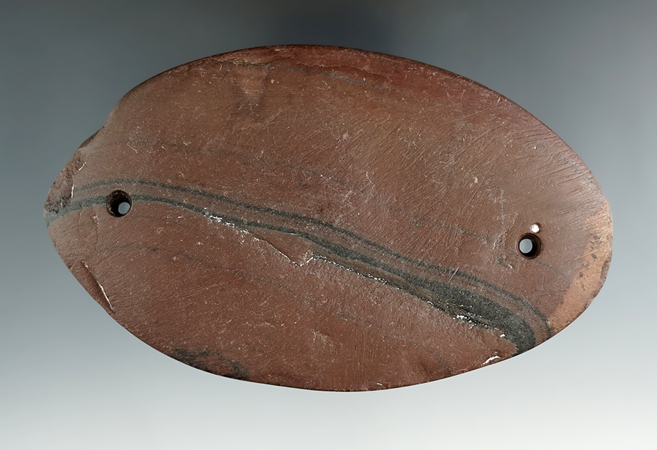 4 7/8" Adena Elliptical Gorget made from red and black Banded Slate, found in Preble Co., Ohio. Pict