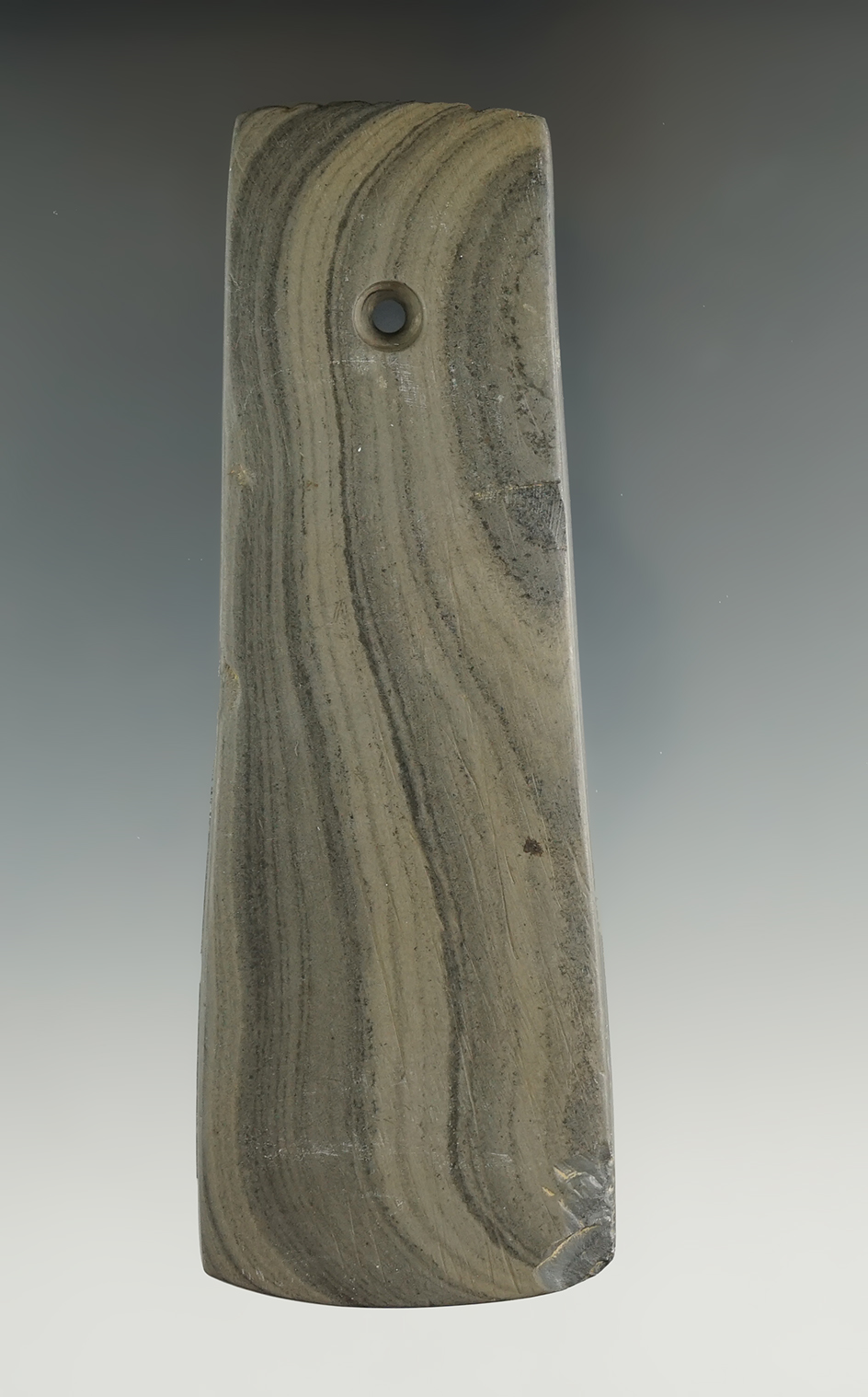 4 11/16" Trapezoidal Pendant with a fringed top, found in Lorain Co., Ohio. Pictured in Prehistoric