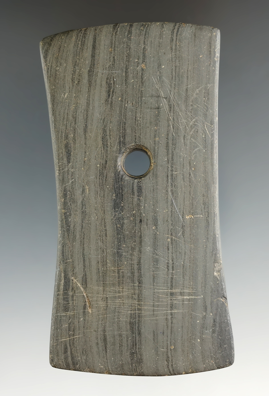 3 13/16" Adena Bi-Concave Pendant found in Washington Co., Ohio by Chuck Rose. Ex. Clifford Bauer.