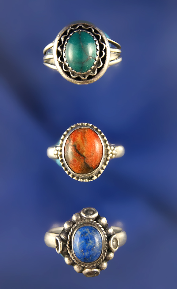 Set of three antique sterling silver ladies rings.