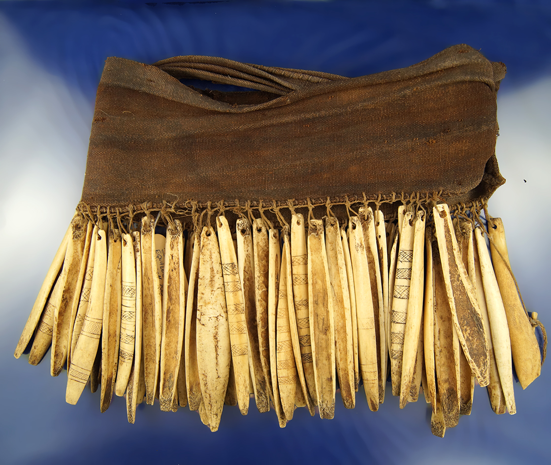 Baby Carrier with engraved bone tinklers. From the Kampa Tribe, Amazon Basin, Ecuador.