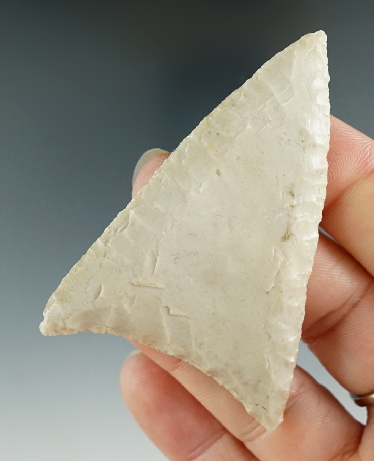 2 5/8" Kinney made from gray flint, found in Texas. Comes with a Bennett COA.