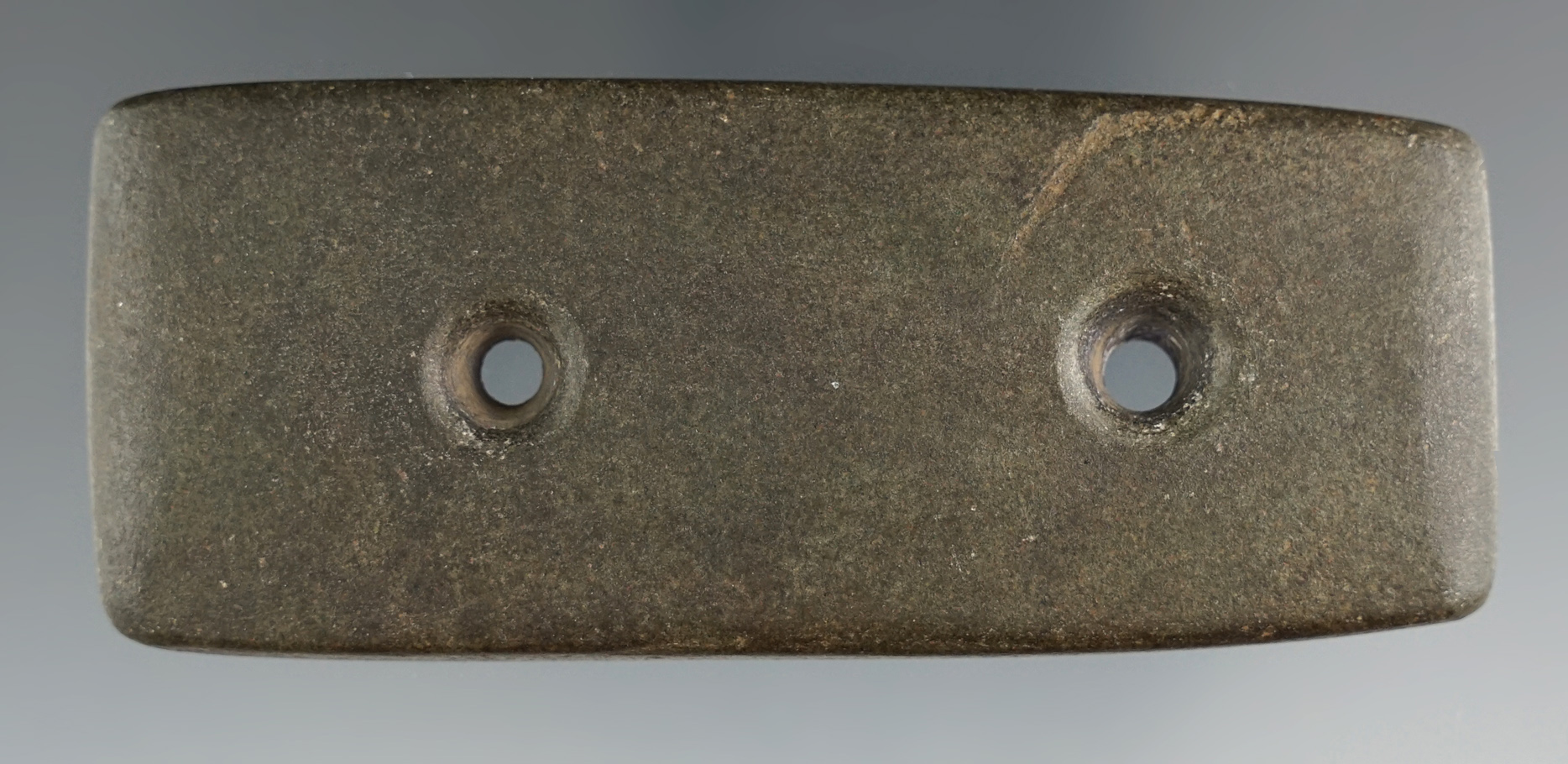 3 3/8" Bar Gorget made from gray and black Hardstone. Found in Wayne Co., Ohio near Moreland.