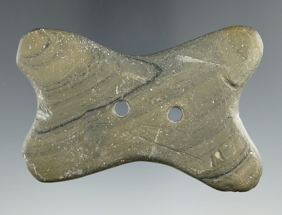 3 1/16" Hopewell Reel Gorget made from green and black Banded Slate, found in Warren Co., Ohio.