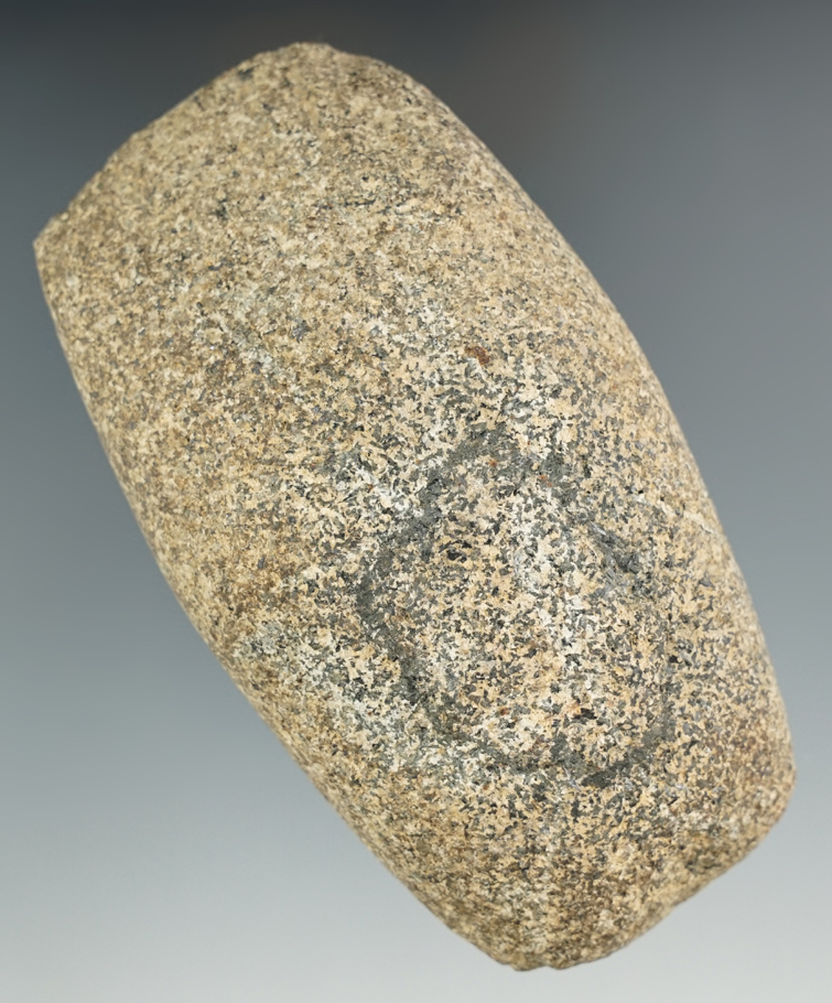 4 1/2" Celt made from tan and green Granite. Found in Fayette Co., Ohio in 1979.