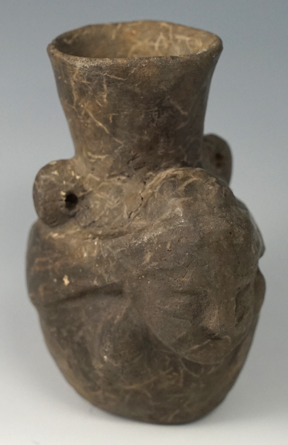 3 3/4" Tall miniature Chimu culture pottery vessel with some restoration. Found in Peru.