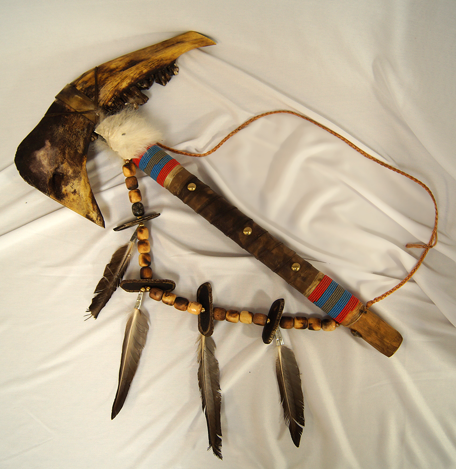 Contemporary display item – Buffalo jawbone Axe with a beaded & wrapped handle.