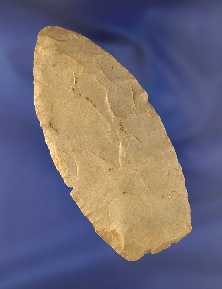 3 5/8" Paleo Knife with a ground stem and sides, found in Ohio.