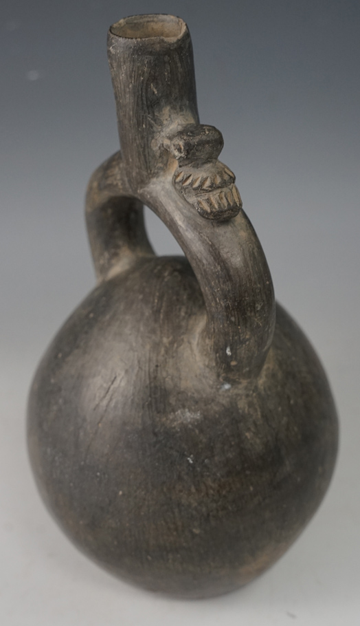 7 1/2" Tall Chimu Mammary Form Stirrup Bottle with a bird effigy on spout. Found in Peru.