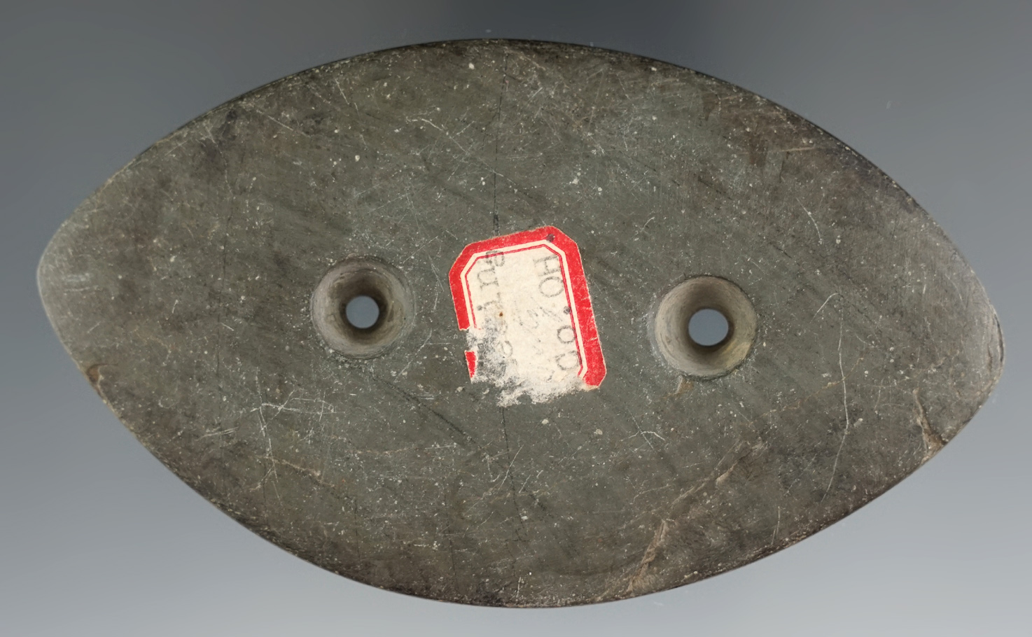 4 3/16" Bi-pointed Gorget found in Medina Co., Ohio. Very nice use wear to holes.