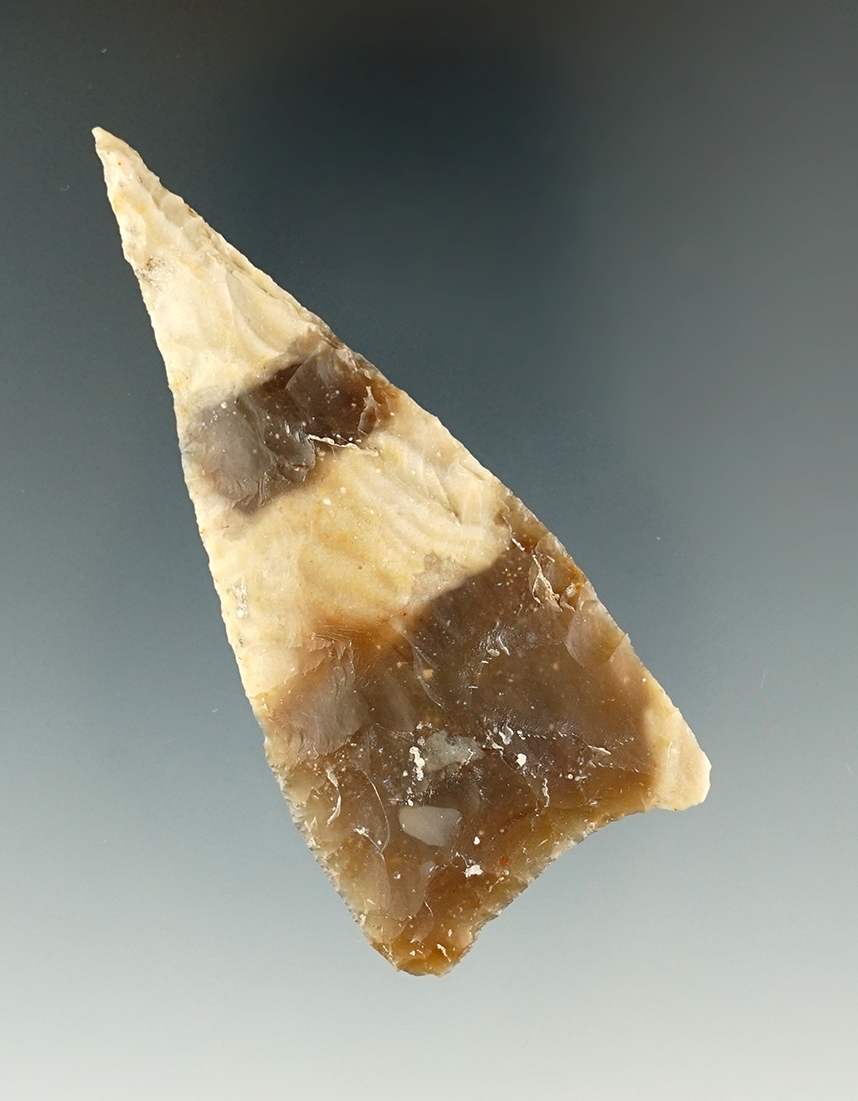 2 3/4" Kinney made from uniquely patterned flint. Found in Real Co., Texas.Rogers COA.