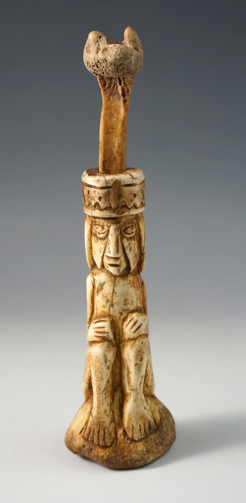 6" Tall Inca carved Bone Lime Container with a human effigy and a Puma head dipper. Peru.