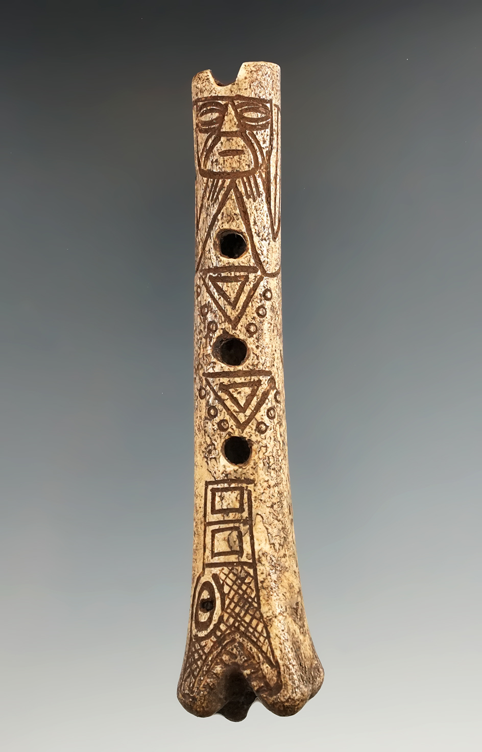 4 11/16" Moche II Bone Flute that is nicely engraved found in northern Peru. Ex. L. L.  Dees.