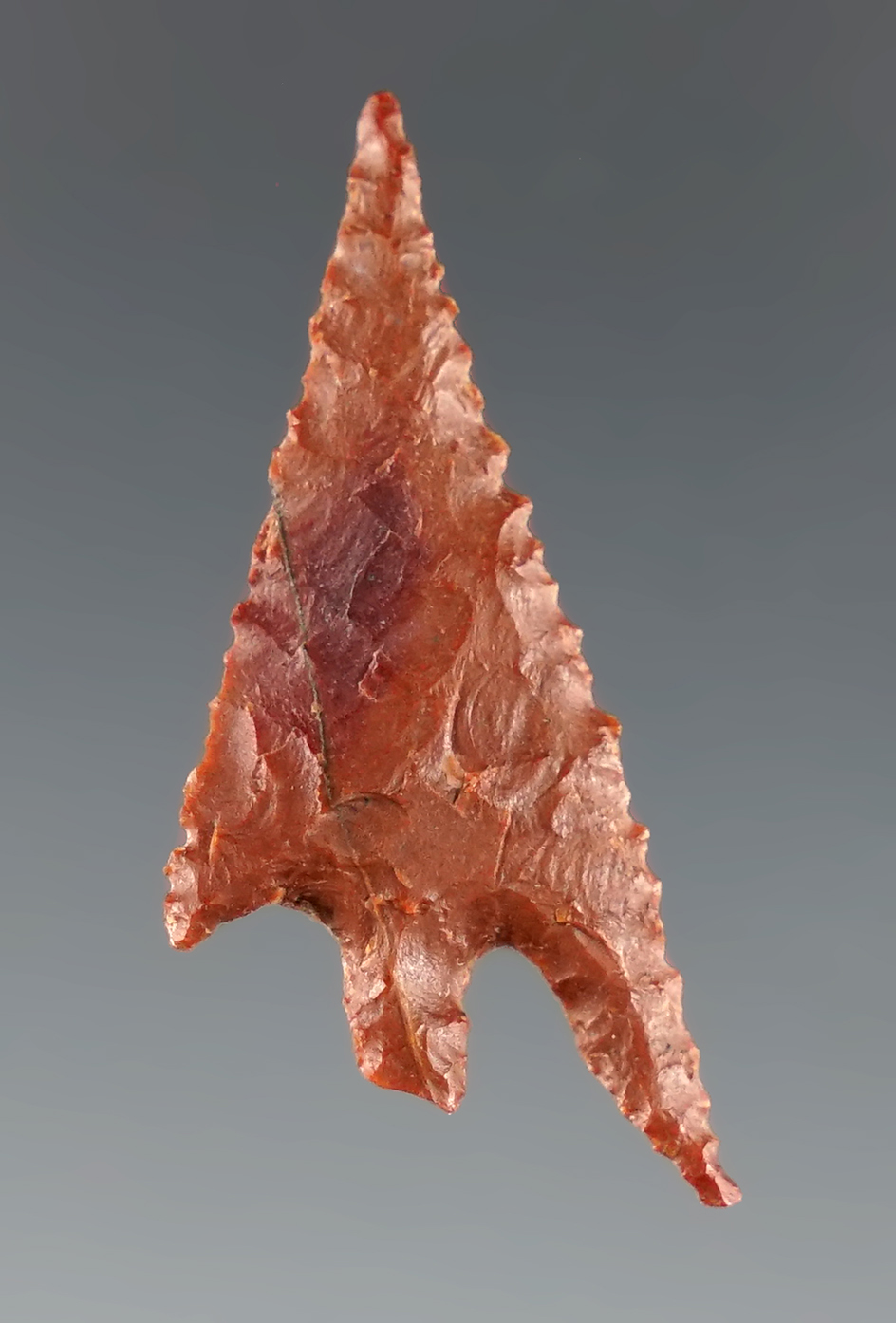 1 5/16" Gunther made from red Jasper with a nice long swept ear found in southern Oregon.