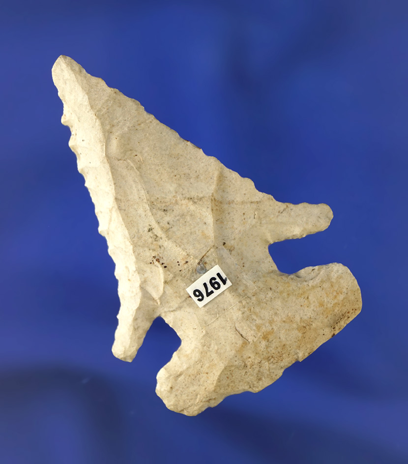 Steeply beveled 2 3/8" Archaic Thebes E-Notch found in Ohio.