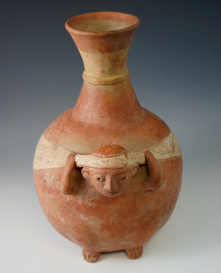 10" Tall well styled Pre-Columbian Pottery Vessel with a human figure, in very good condition.