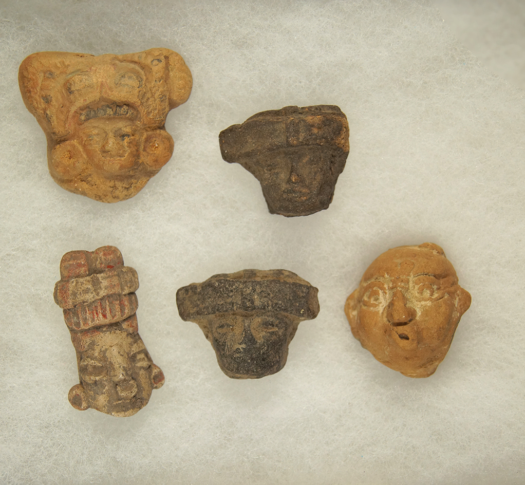 Set of 5 assorted Pottery Heads, largest is 1 3/4".