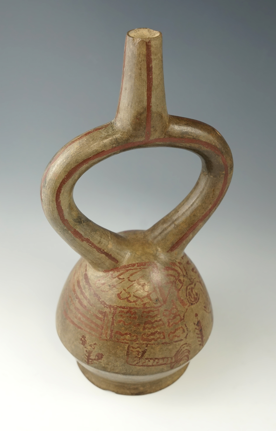 Nice! 10" tall late Moche stirrup bottle with excellent detailed painting. Found in Peru.