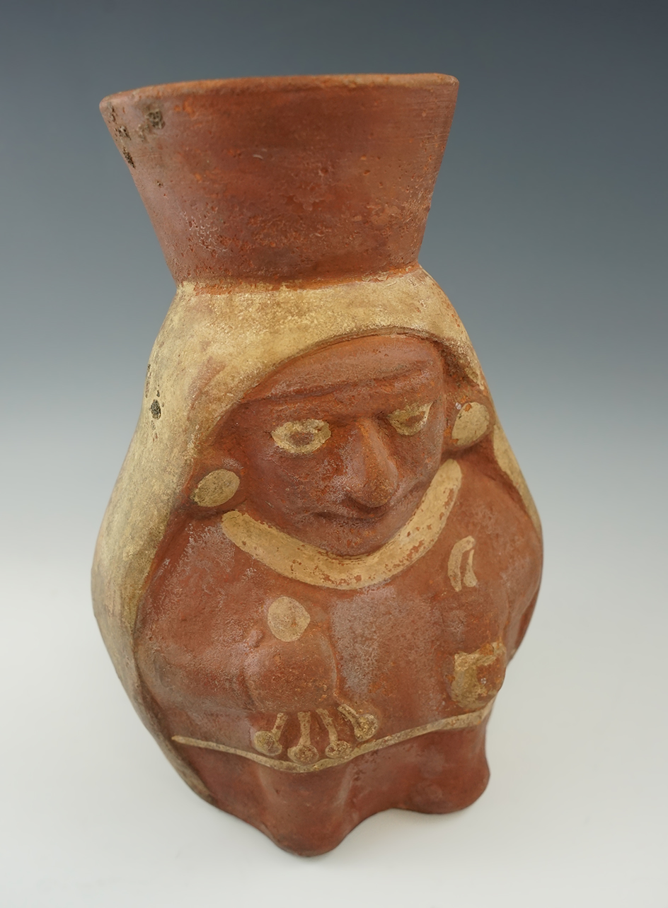 8 5/8" tall x 5 1/4" wide Moche II pottery vessel featuring a healer. Recovered in Peru.