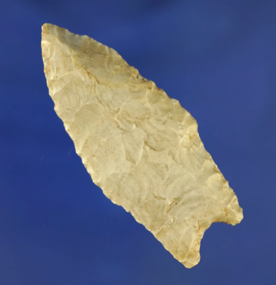 Nicely styled 2 7/16" Stemmed Dart Point found in Webster Co., Missouri.